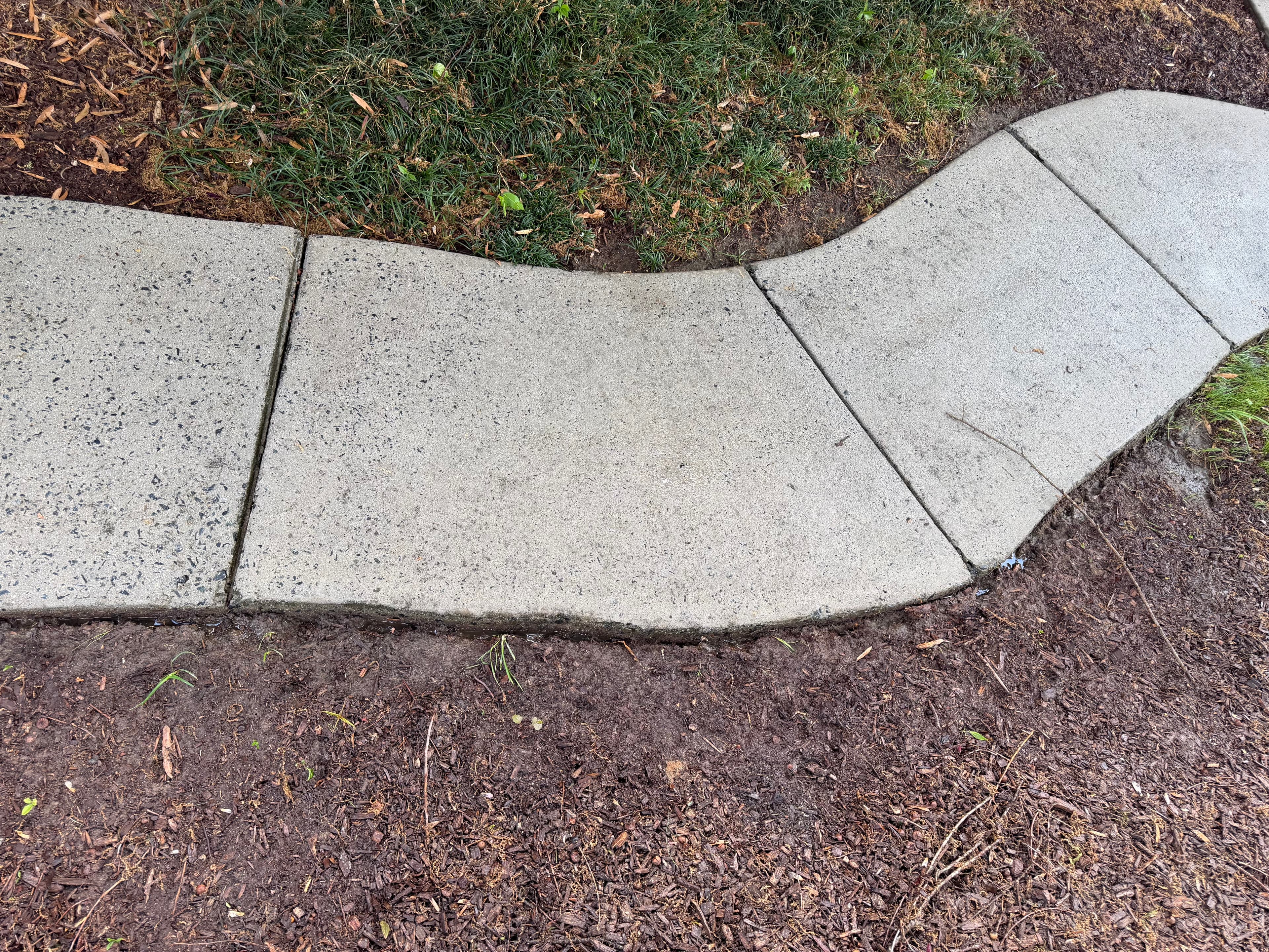 After — Concrete sidewalk pressure washing in Concord, NC